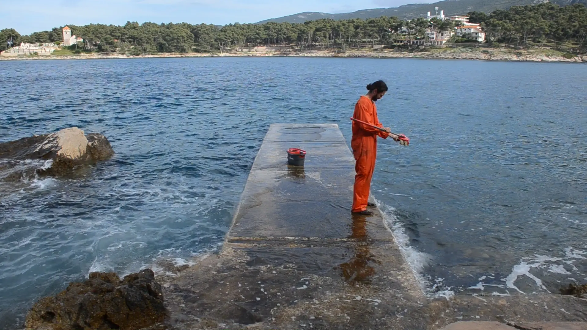Tourists go home - Tourists come back - mopping bay, video still, 2024